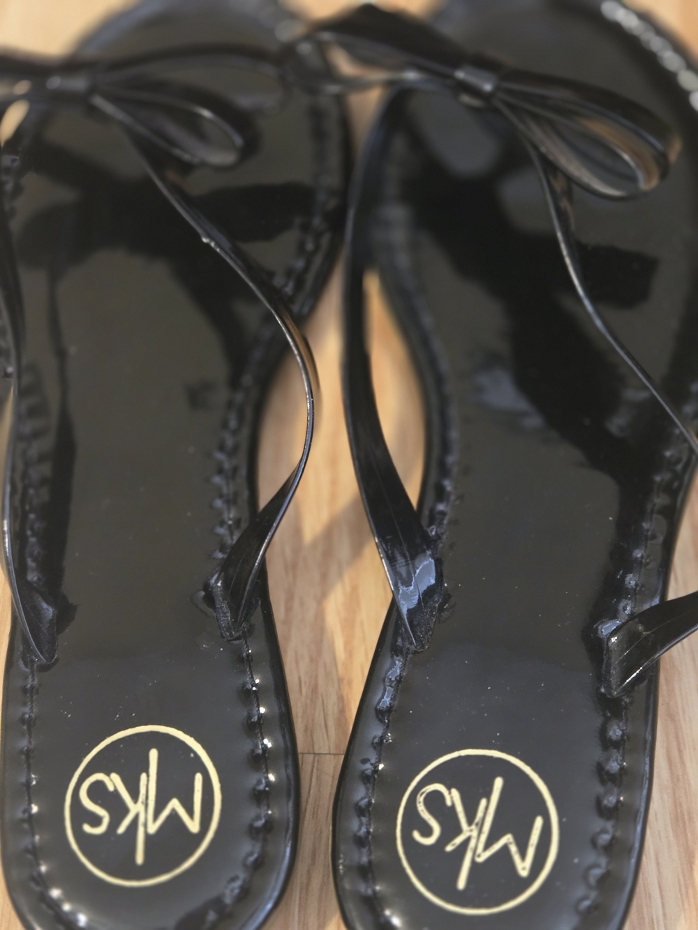Black Patent Thong Sandals with Bow Accent